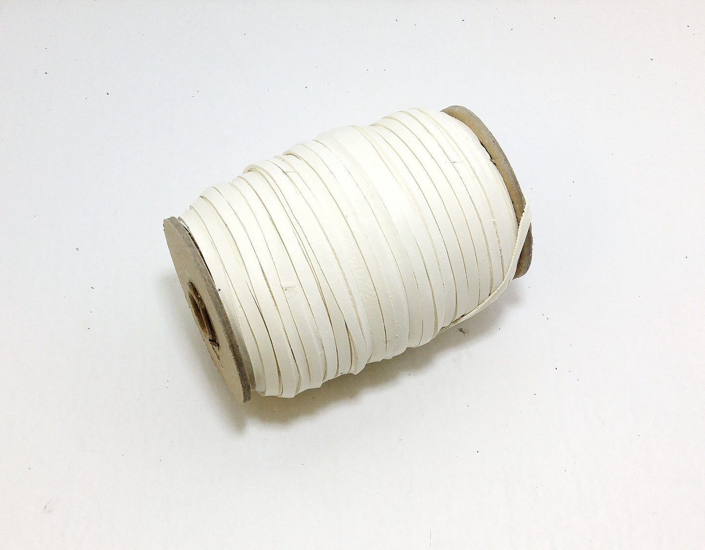 1/8" Flat, Genuine Deer Leather Lacing in White (13 YDS) 0125NHE tan, earth tone, yellow, beige, natural; off white; cream