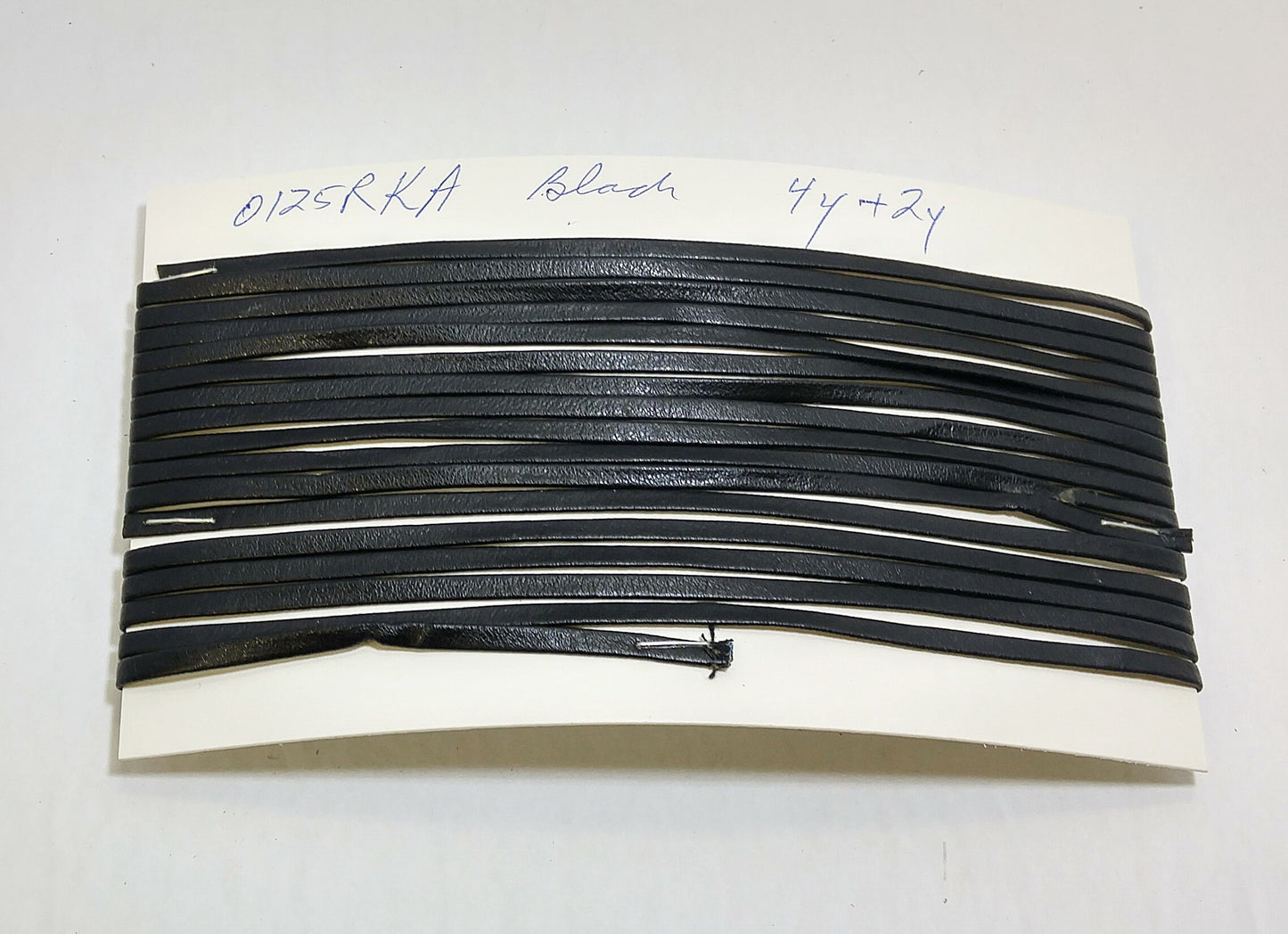 1/8" Double-Folded, Reinforced, Kid Leather Lacing in Black (4 YDS + 2 YDS) 0125RD9 in Two Pieces *card*