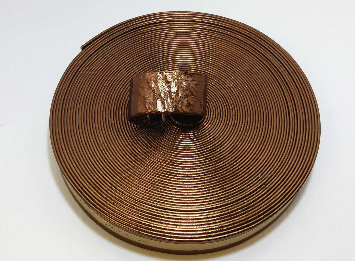 1.5" Double Folded, Reinforced, Cowhide Strap in Bronze Metallic (1 YD) 1500RDD