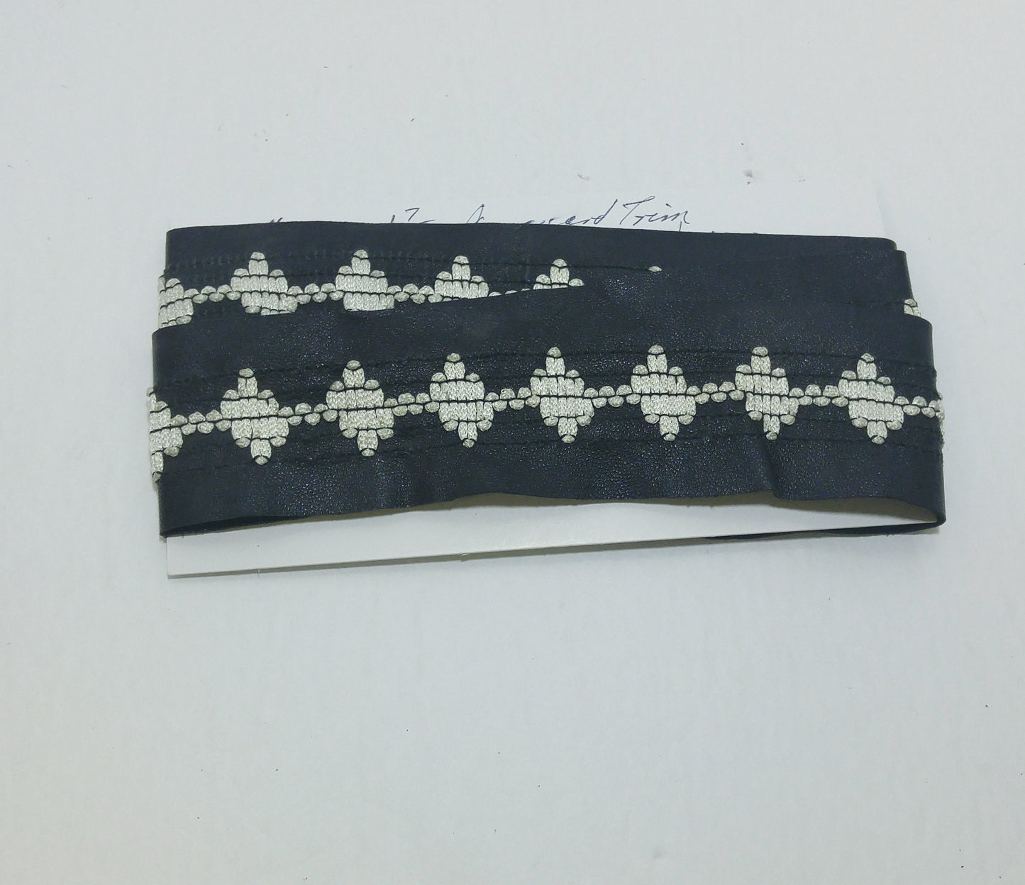 1-7/8" wide jacquard trim inblack 1500 nappa cowhide 56"