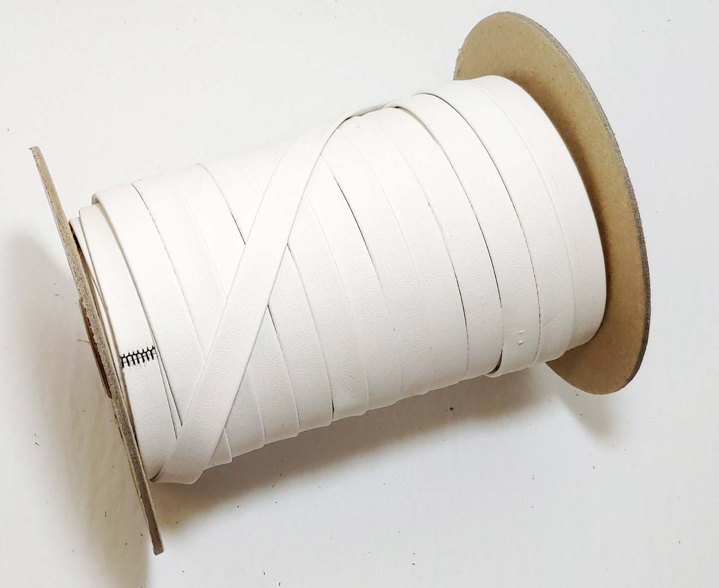 1" wide Eggshell White Polyurethane Faux Leather Strip (3 YDS) Vegan; Lamb Touch softness and finish; soft and supple; 1000BULT