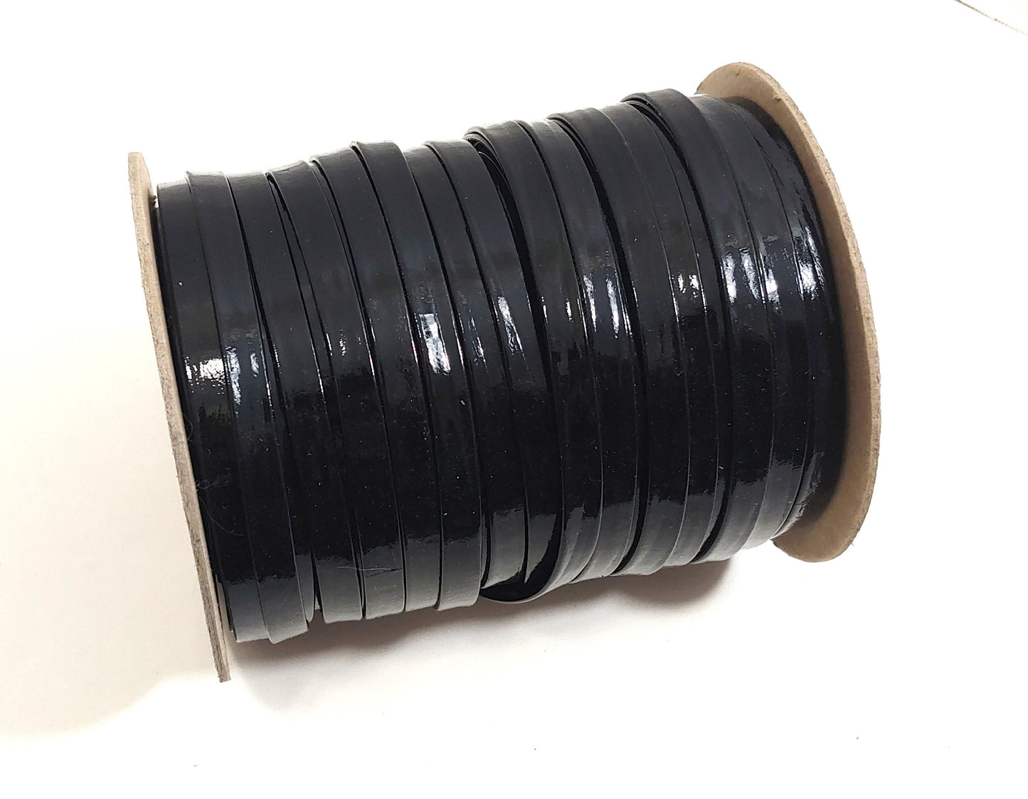 7/16" wide Reinforced Leather Strip in Black Patent 0437GCB Double-Folded OCFR - Off center fold