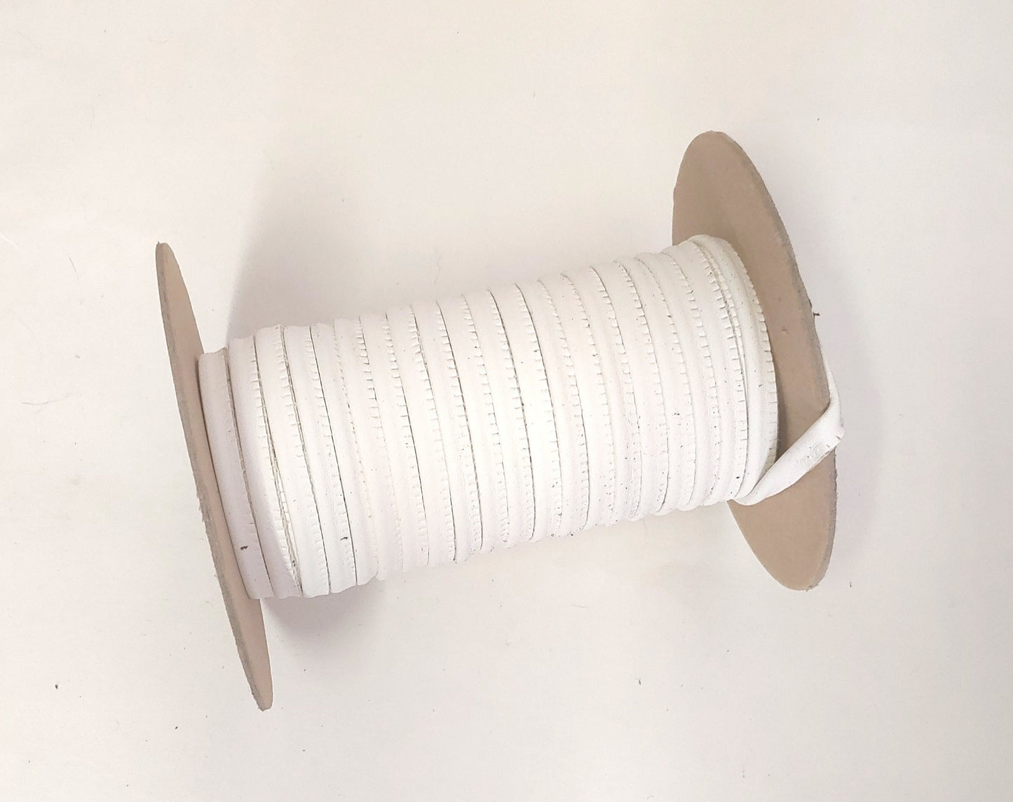 Eggshell White Polyurethane Leatherette Cord Piping 5/16" (5 yds) 2095XULT
