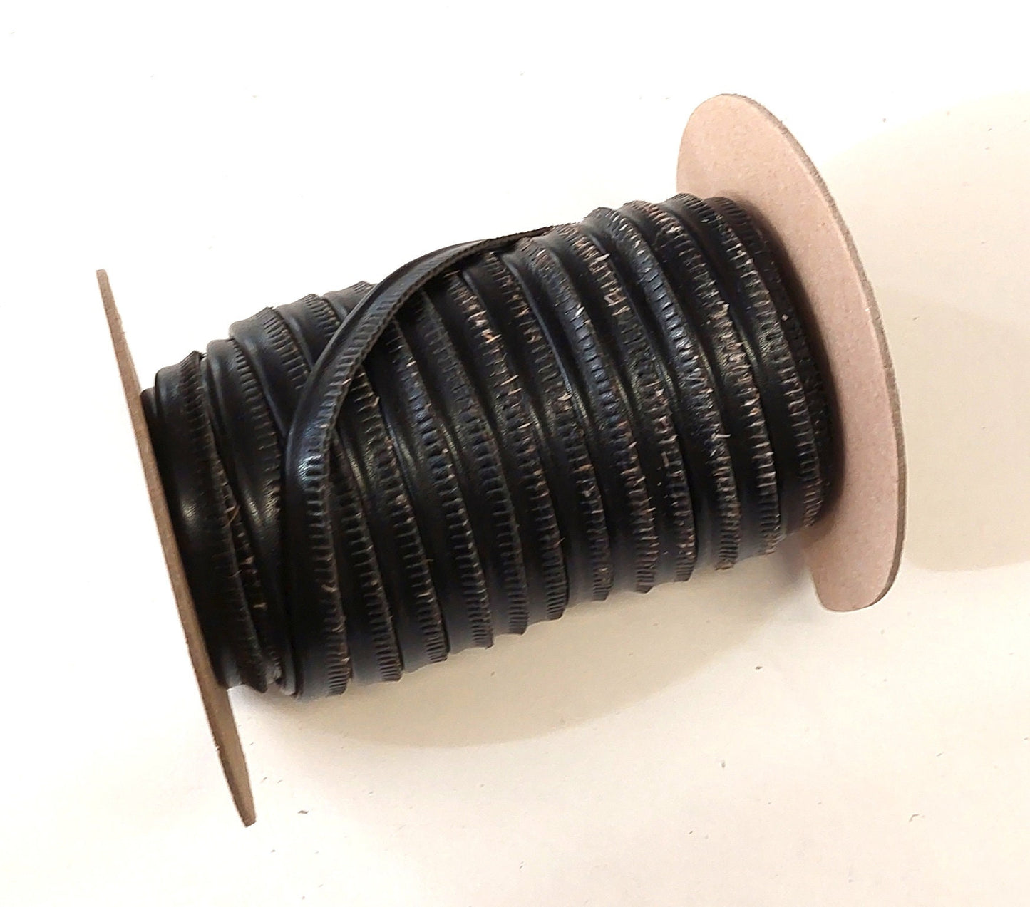 Black KNC Polyurethane Vegan Leather Cord Piping with Slashed Edge 1/2" (5 yds) 3446XUKNC welting