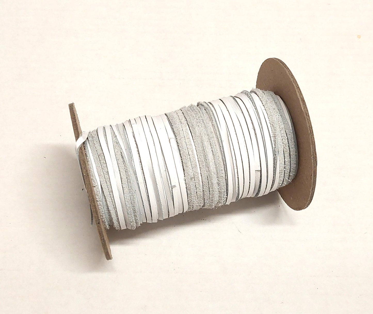 1/8" Flat, Cowhide Leather Lacing in White Duquesa (10 YDS) 0125NDB - jewelry; dream catchers; tassels; DIY; fringe
