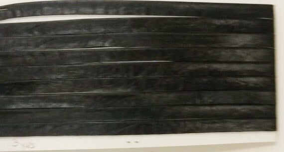Cowhide Stripping 5/16" Side-folded, Black (3 yds) 0312DD9