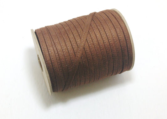 1/4" Stitched and Folded Jewelry Cord in Medium Brown Mottled PE Suede (5 YDS) 2635XTDEN faux suede; jacket cord; belt cord