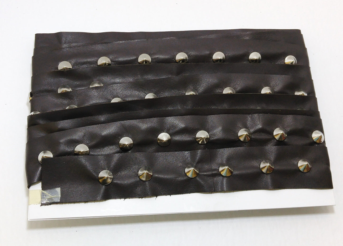 1 YD of 1-1/2" wide Genuine Cowhide Leather Trim Tape with Silver Cone-shaped Nailheads edge binding; top stitch; Medium Brown 3758XD9
