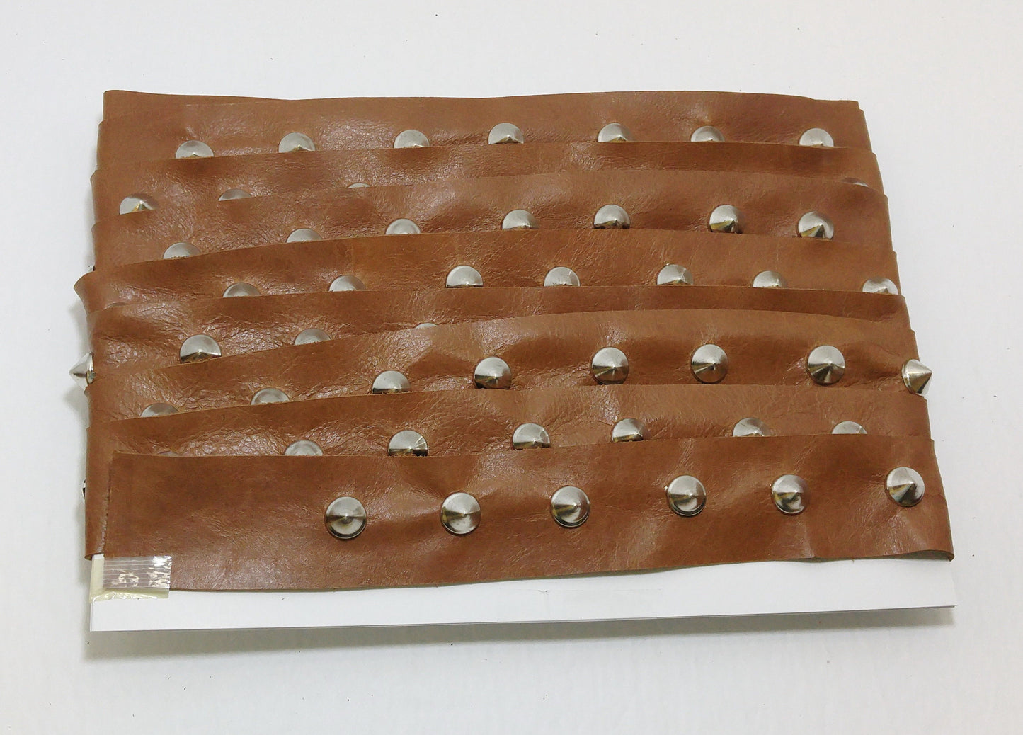 1 YD of 1-1/2" wide Genuine Cowhide Leather Trim Tape with Silver Cone-shaped Nailheads edge binding; top stitch; Corral Brown 3758XDB
