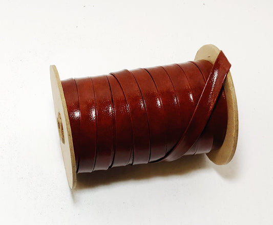 1/4", 3/8", 1/2", 5/8", 3/4" or 1" Leatherette Lacing in Mahogany Patent Vinyl (11 yds) 0312BVBV 0375BVBV 3702XVBV brown; red; wood