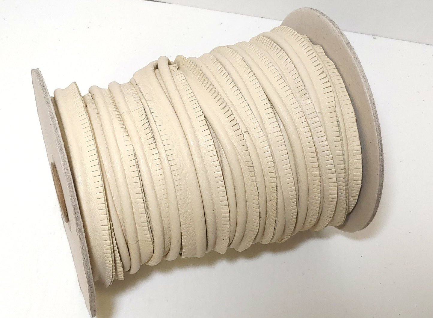 5/8" Round Cord Piping, Genuine Cowhide Leather in Bone UPL (3 YDS) 3118XDD - bold piping; upholstery piping; large cushions