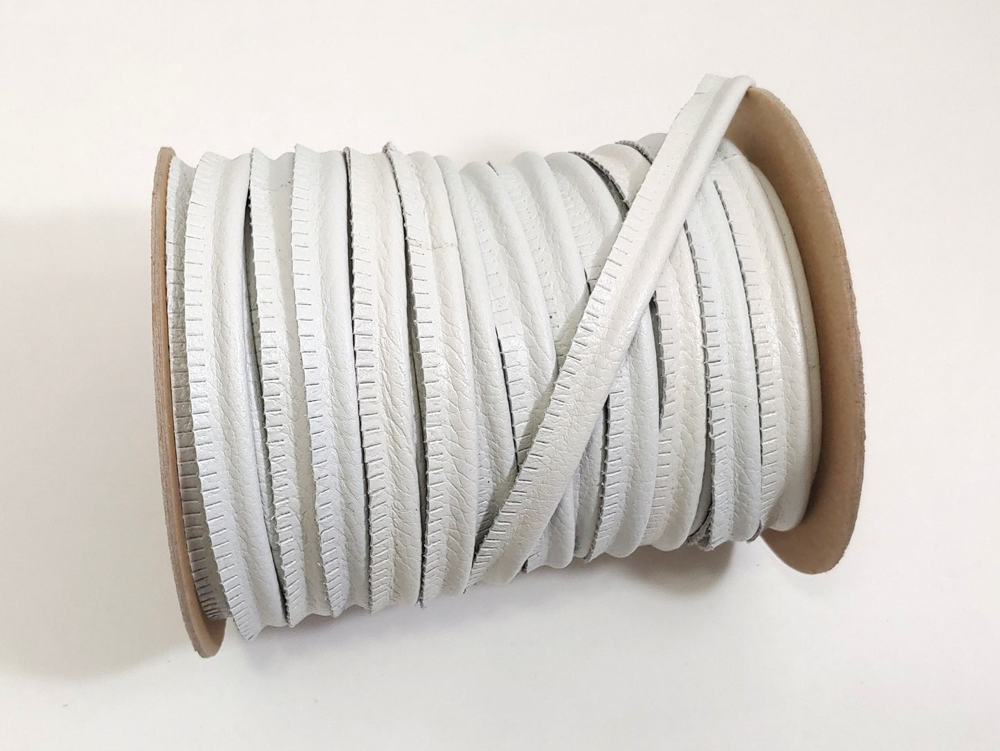 5/8" Round Cord Piping, Genuine Cowhide Leather in Cool White UPL (2 YDS) 3118XCB - bold piping; upholstery piping; large cushions